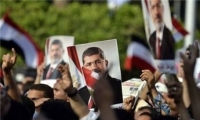 أنصار مرسي يدعون للتظاهر والتصعيد في يوم محاكمته
