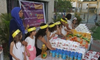 جمعية أهل الخير في جلجولية توزع طرود غذائية للعائلات المستورة 